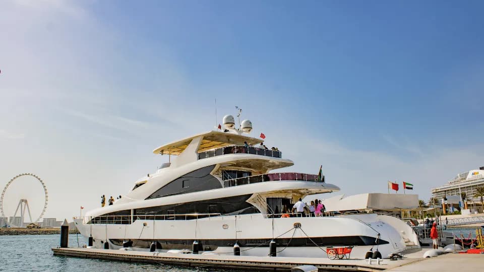 Dubai Harbour Superyacht Experience with Live station & Drinks - Image 1